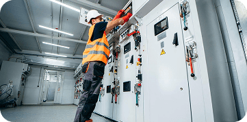 Electrician replacing a power socket
